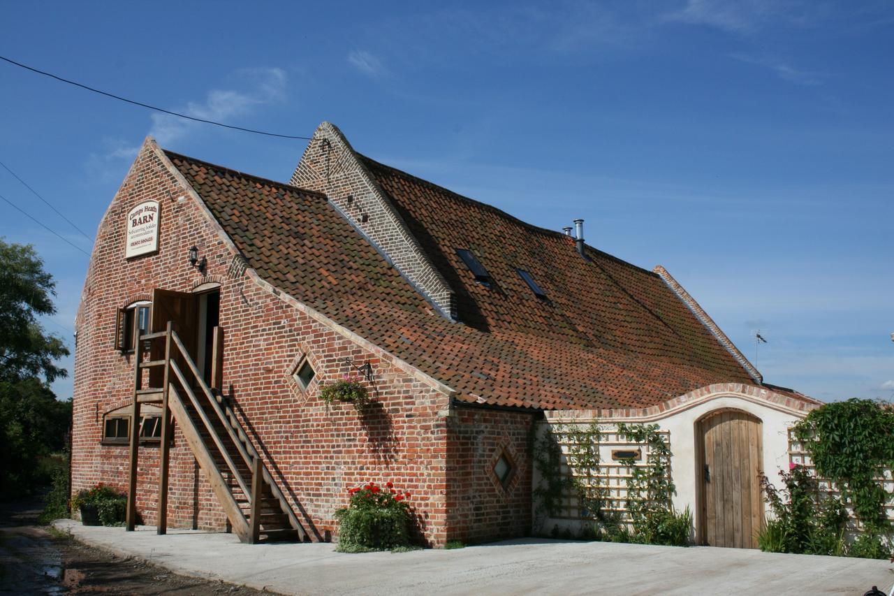 Holiday home Camps Heath Barn *